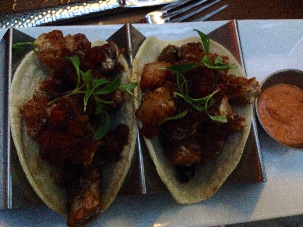 Pork Belly al Pastor Tacos: crispy fried pork belly, pineapple habanero salsa, al pastor aioli, salsa de arbol at Agua 301