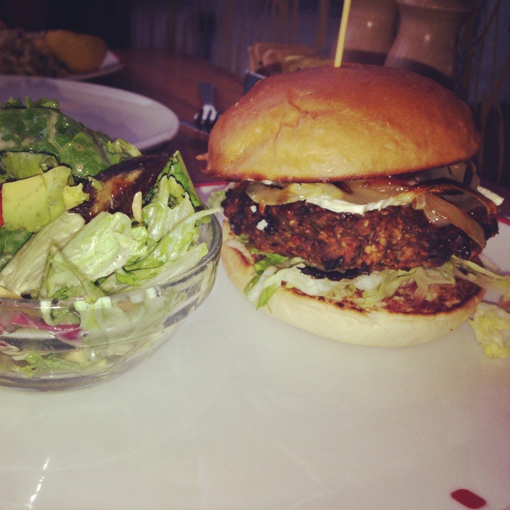 Vegan "Turkey" Burger with Cranberry Compote, Brie, and Griddle Onions at Founding Farmers. 