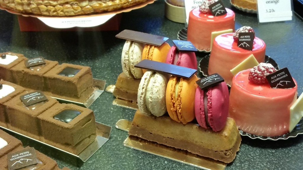 Because why have a macaron when you can have three macarons on top of a pastry?