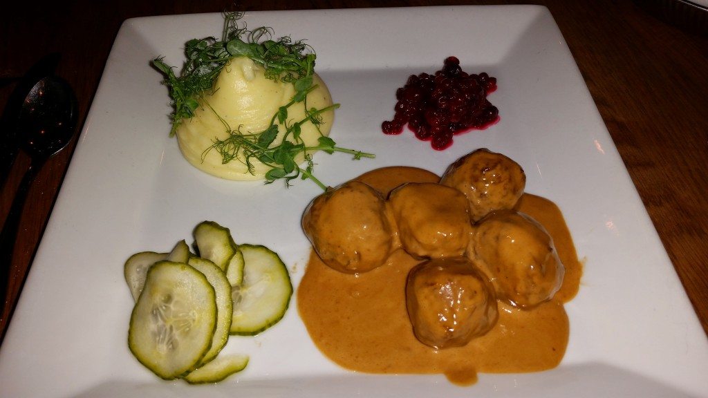 Swedish meatballs with mashed potatoes, pickled cucumbers and ligonberry jam.