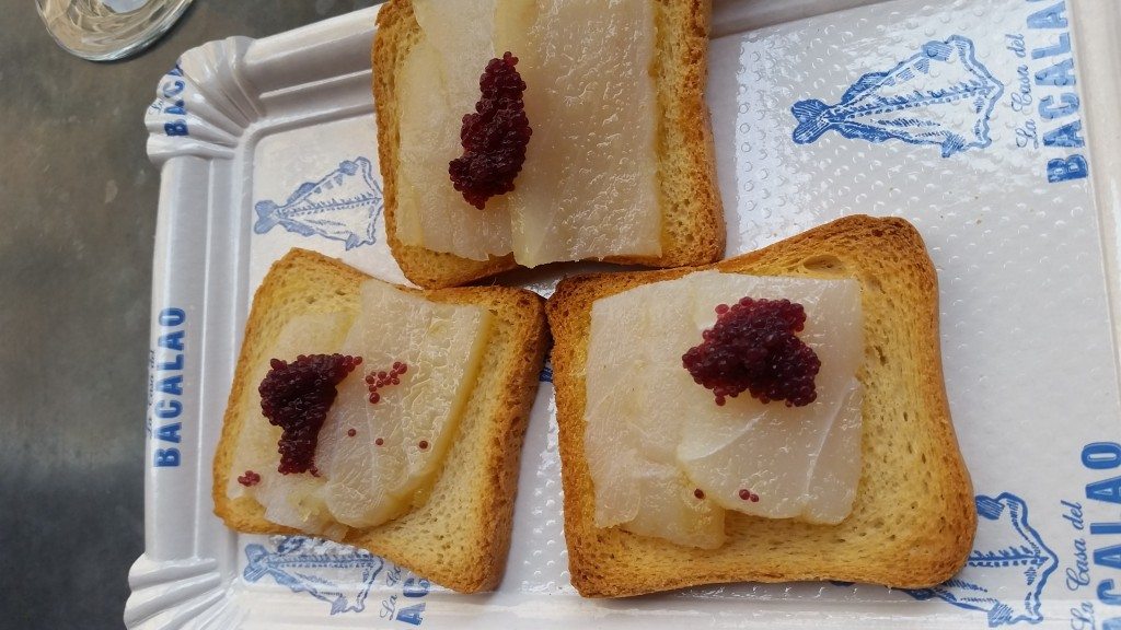 Bacalao (dried salted cod) on toast with caviar. 