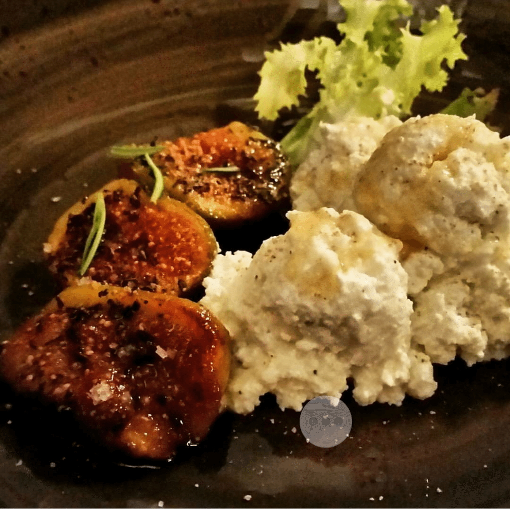 Housemade ricotta with figs, drizzled with honey at Ratana.