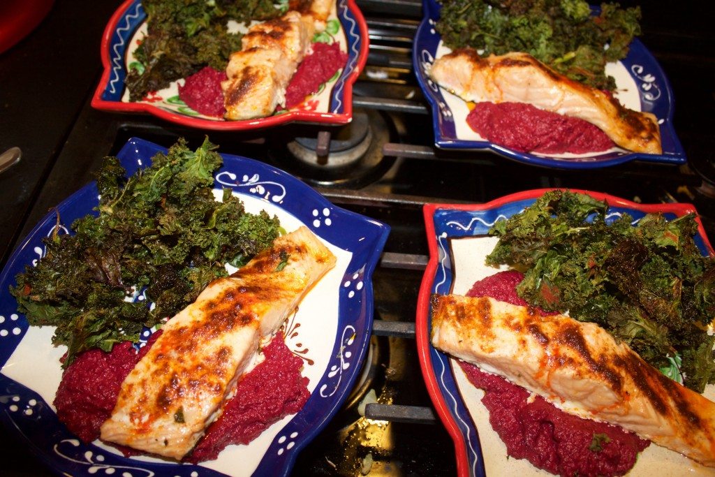 Baked salmon with herbed beet puree and spicy kale chips.