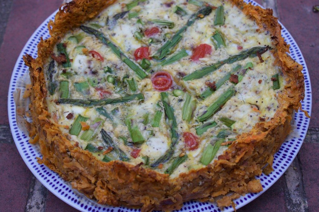 Sweet potato crusted quiche with asparagus, cherry tomatoes and an herbed goat cheese-ricotta blend.  I'll try to remember what I did and post this one  because I really liked it!