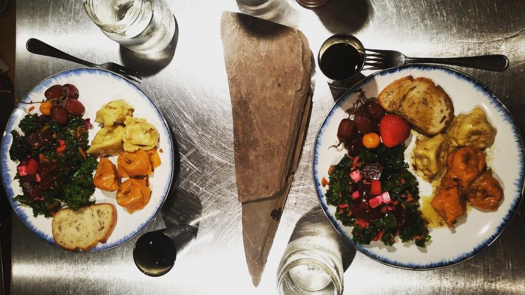 Butternut squash ravioli and brie apple and caramelized onion ravioli in sage butter sauce; kale salad and rosemary bread.